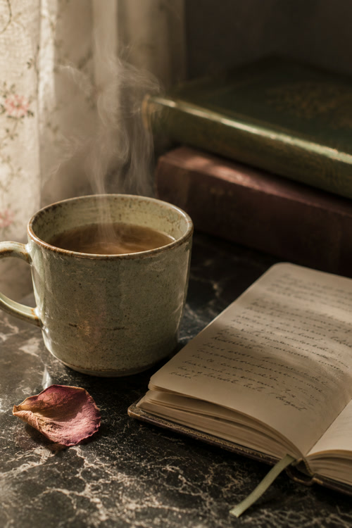 New moon manifesting ritual setup with candle and journal for beginners