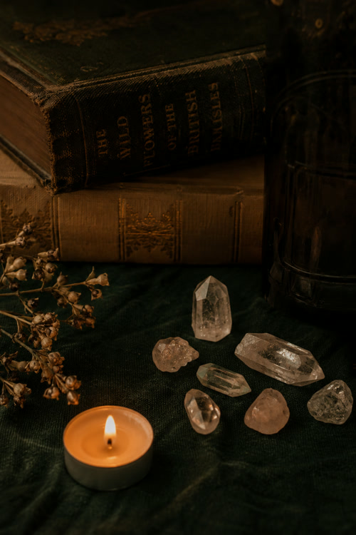 Crystals and candle flatlay for women who are spiritual but not religious